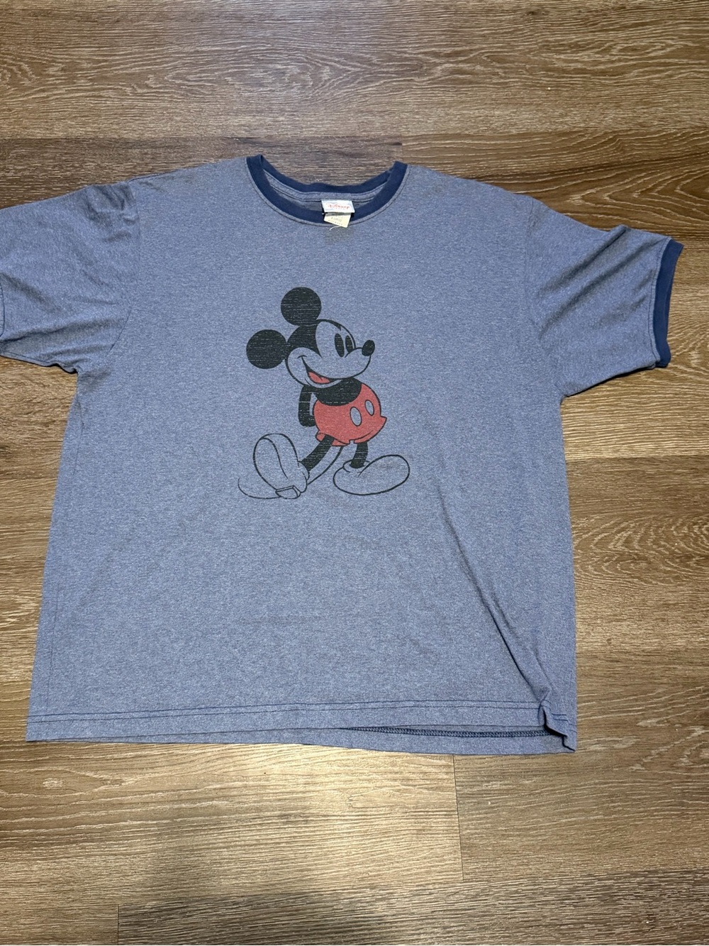 Disney navy blue tee with red logo tag